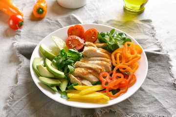 Vegetable salad with roasted chicken breast