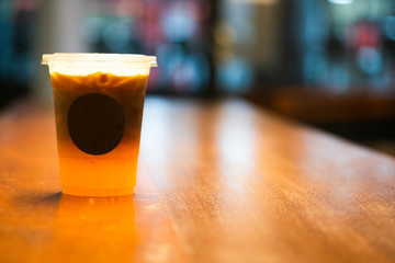 Iced fresh orange juice topped with espresso