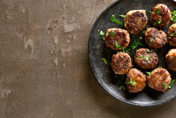 Homemade cutlets on plate