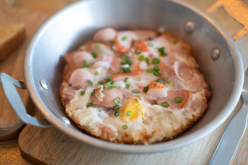 Pan-fried egg with toppings