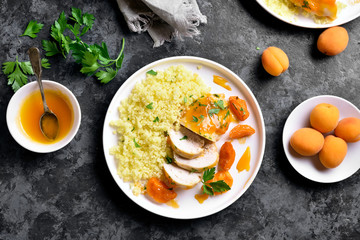 Chicken breasts in apricot sauce and couscous