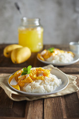 Mango with sticky rice , Thai dessert .