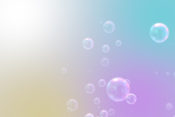 Soap bubbles on pastel natural background for kid and spring