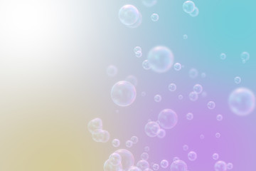 Soap bubbles on pastel natural rainbow background