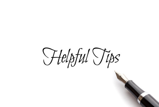 Helpful Tips text on isolated background with Fountain pen
