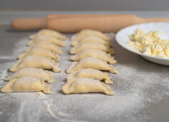 Dumplings with cottage cheese and sour cream.