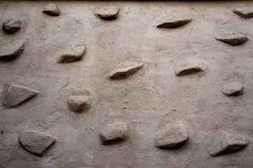 Fototapeta na wymiar Stones with cement wall texture background