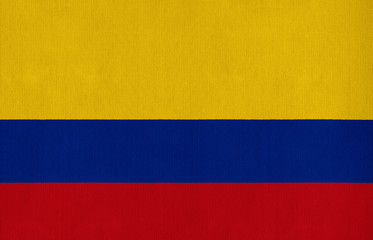 National flag of Colombia on a cotton texture background