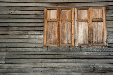 Wooden windows with old teak wood wall house