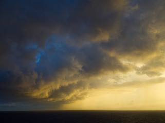 Fototapeta na wymiar Windy Thunderstorm Edge at Sunrise on Caribbean Sea