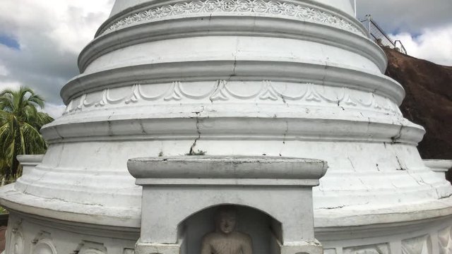 Anuradhapura, Sri Lanka, the view of the Dagoba with a small Buddha 4K