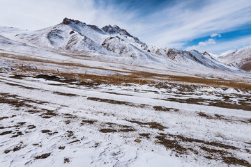 the gravel road on the snow mountain