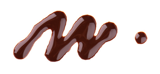 Chocolate syrup drizzle isolated on white background. Splashes of sweet chocolate sauce. Top view.