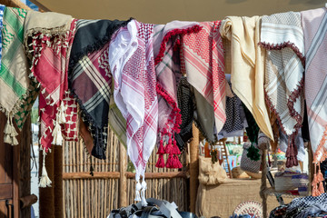 Different style of male head wear at the traditional market in Abu Dhabi