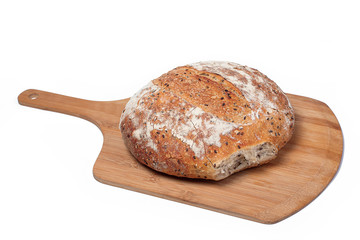 fresh bread on the wooden board isolated on white background