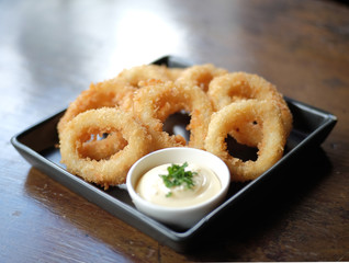 fried squid in black plate