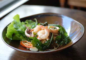  shrimp and squid spaghetti spicy on white background