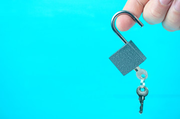 Fototapeta na wymiar lock with keys in hand
