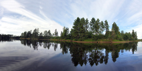 Autumn pike fishing on the Rybinsk reservoir, beautiful panorama.