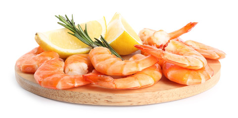 Delicious cooked shrimps served with lemon and rosemary on white background