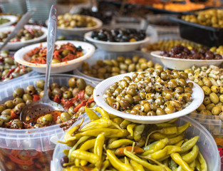 Olives and peppers for sale at the market.