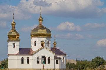 God's new brick temple with a bell tower
