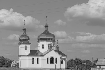 God's new brick temple with a bell tower