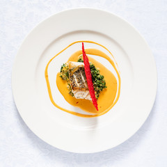 roasted cod with spinach and sauce