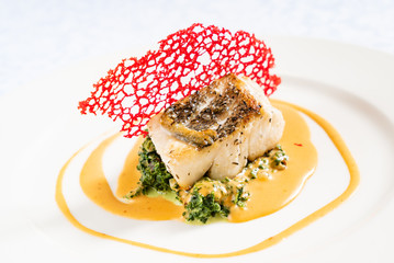 roasted cod with spinach and sauce