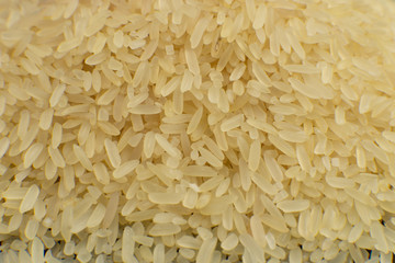 Long grain white rice background. Macro. Rice texture. Top view