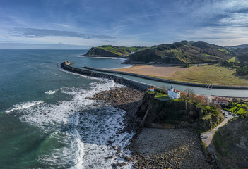 Zumaia lighthouse in Gipuzkoa drone aerial view, Basque country