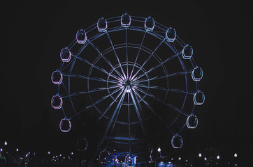 Ferris wheel at night in full height