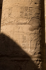 Karnak Temple, complex of Amun-Re. Embossed hieroglyphics on columns. Great Hypostyle Hall. Embossed hieroglyphics on columns and walls.