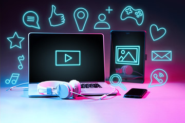 Laptip and touch pad with social media icons.