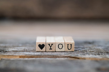 Heart YOU on a wooden background
