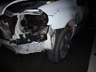 Total car crash smash accident on a road