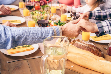 Prayer before meals, Catholics pray.