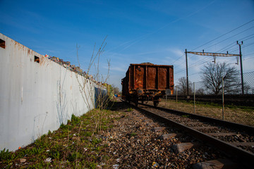 rusty railroad car waiting at recycle station