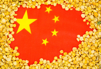 Dried peas on the flag of China. The market concept
