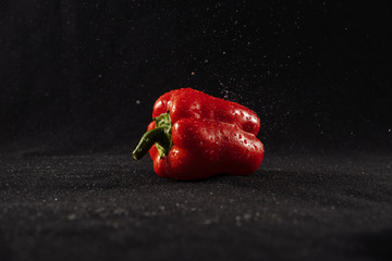 bell peppers on black background, paprika with drops of water on black background, healthy eating vegetables, vegetables for the restaurant