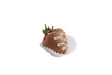 big red strawberry with a green tail with brown milk chocolate and in a paper basket isolated on white background