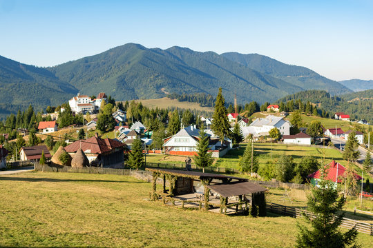 Beautiful fairytale landscape of Tihuta pass Village in North Romania during sunny autumn day