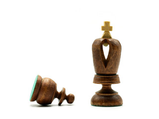 Obraz na płótnie Canvas Obedience Chess Concept: Pawn Lying In Front of A King Chess Piece, Isolated On White Background