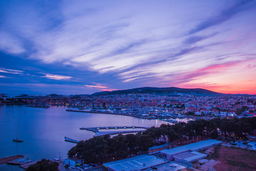 Fototapeta premium Vodice, Croatia / 17th May 2019: Sunset in Vodice, blue hour seafront aerial view