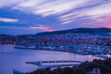 Fototapeta premium Vodice, Croatia / 17th May 2019: Sunset in Vodice, blue hour seafront aerial view