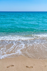 Fototapeta na wymiar Blue sea on Aegean sea. Sandy beach in Greece