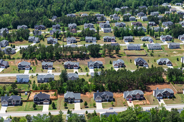 Aerial view of modern suburban cul-de-sac neighborhood streets in the southeastern United States.  