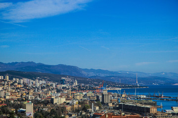 Fototapeta na wymiar Rijeka, Croatia / 22nd March 2019: Cityscape, aerial view on Rijeka Harbour and buildings
