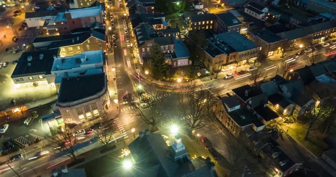 Aerial night hyperlapse, busy traffic Small Town America, Christmas lights, decorations, timelapse, hustle and bustle
