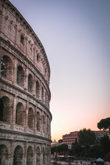 Sunset view of Colosseum in Rome, Italy. Rome architecture and landmark. Long exposure